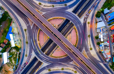 Aerial view Expressway motorway highway circus intersection at Night time Top view , Road traffic in city at thailand.