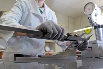 woman makes the metrological measurements