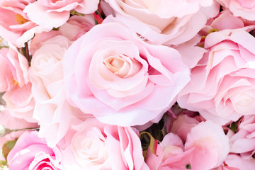 Soft focus of artificial pink roses background