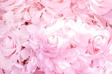 Soft focus of artificial pink roses background