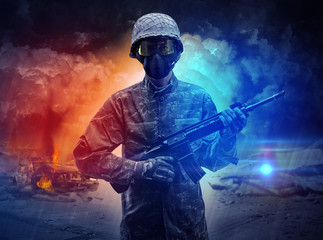 Fototapeta premium Uzbrojony żołnierz ze snajperem w środku burzy piaskowej