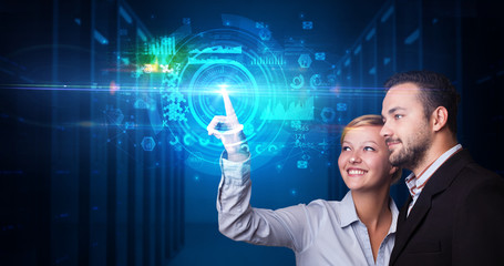 Man and woman touching hologram screen displaying medical symbols and charts
