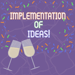 Handwriting text Implementation Of Ideas. Concept meaning Execution of suggestion or plan for doing something Filled Wine Glass Toasting for Celebration with Scattered Confetti photo