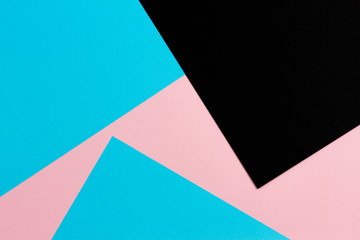 Abstract geometric shape pastel pink, light blue and black color paper background