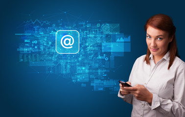 Young person using phone with mail and online communication concept
