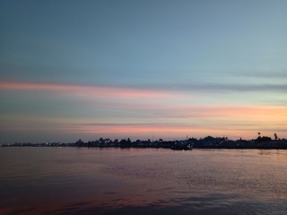 the sky when the sun will rise in the river