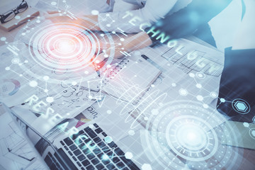 Double exposure of woman's writing hand on background with data technology hud. Big data concept.