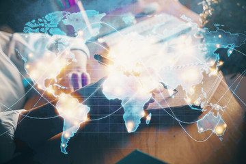 International business hud over woman's hands writing background. Concept of hard work. Double exposure