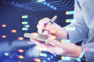 Writing human hands with tech theme multi exposure icons.