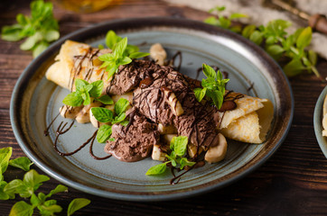 Decorated pancakes with chocolate ice cream
