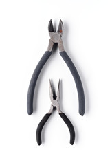 used pliers for domestic use on white background