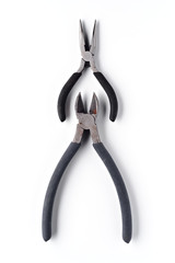 used pliers for domestic use on white background