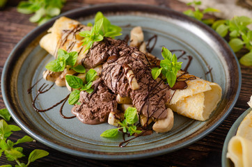 Decorated pancakes with chocolate ice cream
