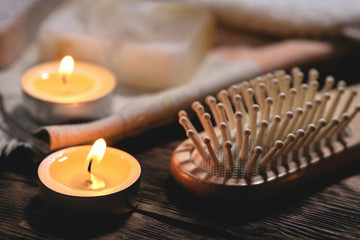 Bath or bathhouse accessories on a wooden table background.