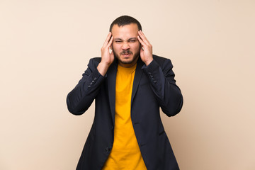 Colombian man over isolated background unhappy and frustrated with something. Negative facial expression
