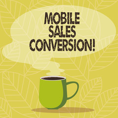 Conceptual hand writing showing Mobile Sales Conversion. Business photo showcasing Any desired action that you want the user to take Mug of Hot Coffee with Blank Color Speech Bubble Steam icon
