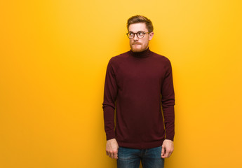 Fototapeta premium Young smart man thinking about an idea