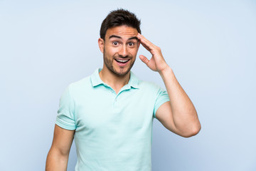 Fototapeta premium Handsome young man over isolated background has just realized something and has intending the solution