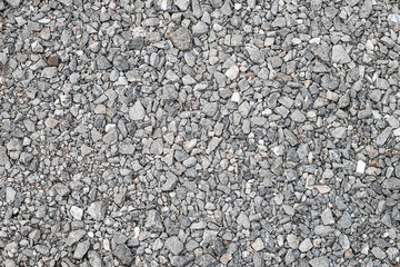 The background of the road is made of gray stone.