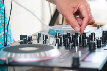 Deejay hand on equipment deck