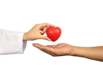 Doctor holding a red heart ball to Senior man on white background, Medicine and Health care concept
