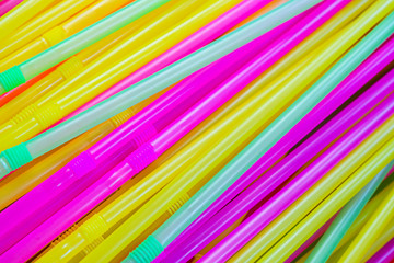 Colorful plastic straws drinking background