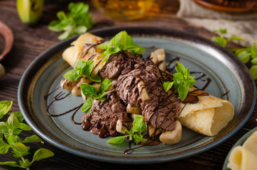 Decorated pancakes with chocolate ice cream