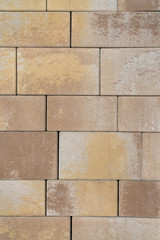 Obraz premium Background. Beige paving tiles. vertical photo