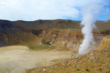 Active volcano Mount Egon with a caldera and sulfuric gasses coming from within the volcano on East Nusa Tenggara, Flores, Indonesia