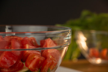 Beautiful, juicy tomato sliced on a wooden table