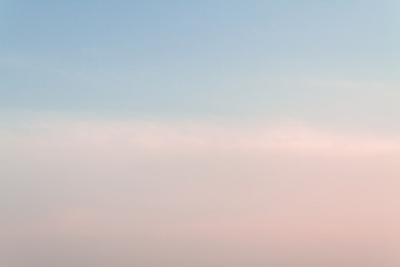 Beautiful sunset sky with feathery pink clouds in spring