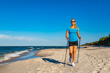Nordic walking - young woman training