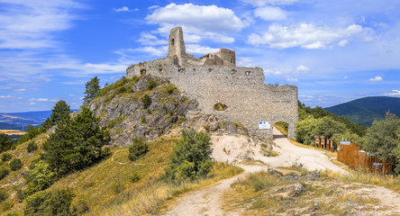 Fototapeta na wymiar Cachticky hrad (Cachtice castle), Slovakia. Hungarian: Csejte vára. Castle ruin which stands on a hill next to the village of Čachtice, built in the mid-13th century. Castle wreck in Trencin region.