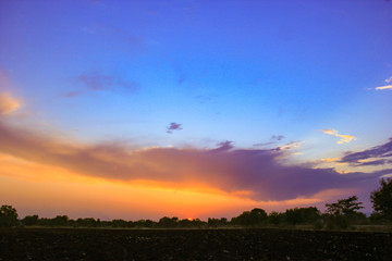 Sunset / sunrise with clouds, Panoramic view of a cloudy sky at sunset 