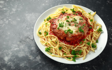 Chicken Parmesan with Cheese and Marinara Sauce served over spaghetti, pasta