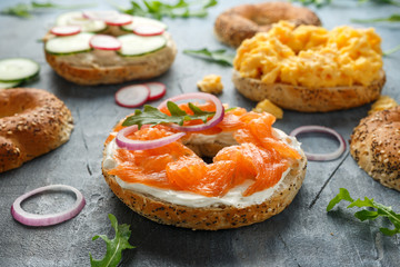 Healthy Bagels breakfast sandwich with salmon, scrambled eggs, vegetables and cream cheese