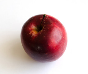 Red apple on white background, closeup