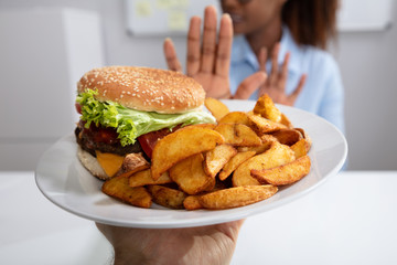 Woman Refusing Unhealthy Food