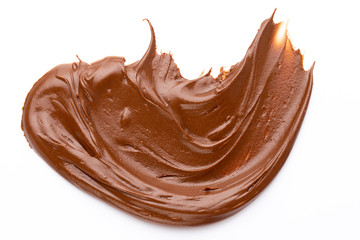 Chocolate cream isolated on white background. Flat lay.