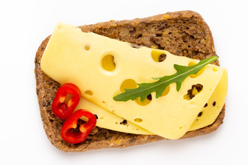 Sandwich with lettuce, cheese on white background.