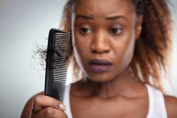 Worried Woman Suffering From Hairloss