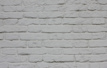White brick wall background pattern. Abstract stone texture on empty painted wall surface  
