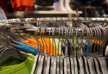 Fototapeta premium Clothes hanging in a shopping mall