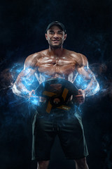 Fototapeta na wymiar Muscular fitness sports man, atlete with barbell in fitness gym. Energy and power.