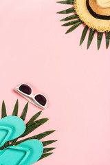 Summer flat lay background on pink.