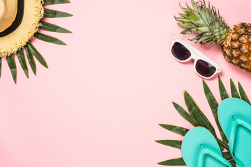 Summer flat lay background on pink.