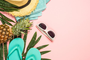 Summer flat lay background on pink.