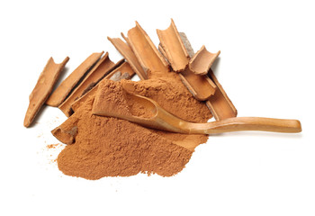 Cinnamon Sticks and Ground Cinnamon on a white background