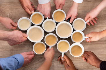 Group Of People Holding Coffee Cups