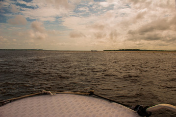 Manaus, Amazonas, Brazil: The merger of the two colored river, Rio Negro, Solimoes. 